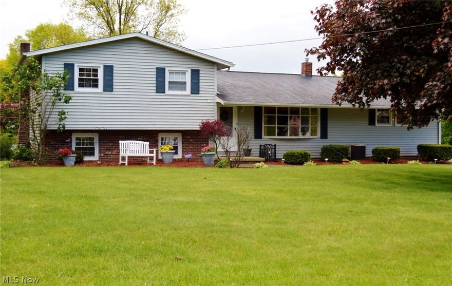 Great NW Perry Twp location for this 4 bedroom 2 full bath home with attached 2 car garage and an additional 2+ car garage, great for car enthusiast or hobbyist. This 4-level split features hard wood floors in the living room, dining room, and master bedroom. The lower level family room has a brick fireplace and sliding door leading to outside patio. There is also a 4th bedroom or office and a full bath as well. The Kitchen has plenty of cabinet space and appliances. The lovely private rear yard can be enjoyed from the large rear deck. There is a shed for additional storage. The neighborhood is conveniently located to many amenities. Don't hesitate, call today!