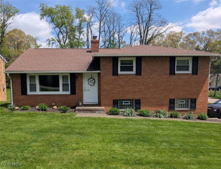 Don't let this one slip away! This beautiful updated brick home features 3 nice size bedrooms, 2 full baths, 2 car garage, and almost a half acre lot in Perry. Updates in 2018 include beautiful white kitchen, shaker style cabinets with soft close drawers, stainless steel appliances and over-sized sliding door leading to large deck and new vinyl fence installed. Perfect for the summer nights. Completely updated bathrooms. Vinyl floors in living room and carpet in all bedrooms. Also in 2018, new paint, lighting, plumbing, flooring (kitchen and baths), water heater, entry doors, garage doors, glass block windows, landscaping and much more! Newer roof, furnace and central air. Garage entrance located on a side street makes for easy access along with extra parking and patio area. Garage is nicely finished and feels more like a rec area than a garage! Lower level basement is clean and makes a great space for a private office, exercise room, or a bonus family room! There is also an attic area for extra storage. In the backyard, you'll find a shed for storing mowers and lawn tools! This solid brick home is in a great location close to everything, yet nestled in a quiet Perry neighborhood with lots of living and entertaining space. Come check it out!