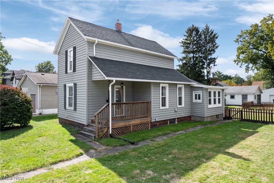 Welcome to your cozy retreat on 31st Street in Barberton!  Accessed via a private alley, enter into a cottage-like escape with a fenced in backyard and brick-style paver patio perfect for evening gatherings or quiet mornings with a steaming cup of coffee. The detached garage offers room for one car plus ample space for equipment and a handy workbench.
Enter through the back door into a welcoming mudroom that flows seamlessly into the heart of the home, a spacious kitchen boasting fresh new flooring, a breakfast nook for weekend brunches, and a timeless backsplash that ties it all together with effortless elegance. From here, you have direct access to the large dining area, which opens to a generous living room, ideal for family movie nights or heartfelt conversations.
On the main floor, discover a versatile large room (once a bedroom) cleverly converted into a first-floor laundry space, but with endless potential as a combo laundry-bedroom, home office, or whatever sparks your imagination. It's conveniently attached to the home's full bathroom, featuring soft green vintage charm that adds a touch of nostalgic appeal.  Upstairs, two good sized bedrooms await, including one with a large closet and a delightful small loft- envision it as your personal reading nook, curled up with a book. 
You're close to local gems like Leach's Meats and Sweets for fresh baked goods and groceries, or Durbin's Magic Freeze for their legendary hot fudge- a true community staple that sweetens the deal.
This isn't just a house; it's where comfort meets connection, inviting you to build memories in a town within close proximity to so many of Northeast Ohio's amazing attractions.
Recent updates (in 2025) include:  New roof, gutters and downspouts, carpet throughout, kitchen and laundry room flooring, new bath/shower surround, new dishwasher, freshly painted interior.  Seller is generously offering a one-year Home Warranty through Old Republic Home Protection.