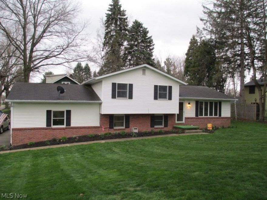 WELCOME HOME!  This 3 BR 2 BA Perry Twp. home has so much to offer and has been well maintained.  New wood floors & carpet in 2016.  Updated baths in 2015.  Slider off dining room leading to a large back deck.  Updated kitchen appliances included.  New furnace in 2010.   Oversized 2 car garage w/extra concrete parking pad.  This house truly is a must see at this price and will make a great place to call home.