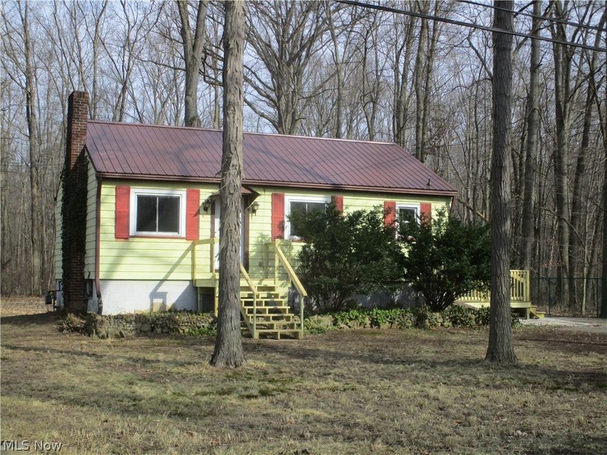 What a great location for this completely renovated 2 BR home on a 1/2 acre lot. The house has new,natural gas furnace, electric hot water heater, kitchen cabinets, stove ,fridge, dry wall, vinyl flooring & carpets, pex plumbing throughout, 2 decks, metal roof on house & garage and an updated septic system. There is a sump pump in the basement & the septic system has a warranty that will transfer.