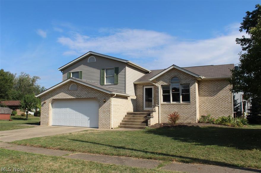 Totally updated 3 bedroom, 2 1/2 bath 4 level split on corner lot on cul-de-sac street. Kitchen is gorgeous with cherry cabinets, stainless appliances and is open to the dining area. Main level also has a large living room and a foyer with hardwood floors. 3 bedrooms and updated full bath upstairs. Master has 2 double closets. Lower level features a family room and updated 1/2 bath. The basement has full bath and plenty of storage. 2 car attached garage. Side deck off the family room. Nice sized yard with storage shed. This home is move in ready!