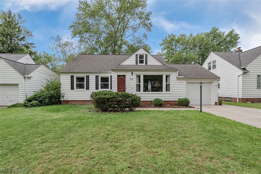Welcome home to this lovely cape cod situated close to everything you need in Lyndhurst! This charming home features an eat-in kitchen, four spacious bedrooms, and a lovely backyard. All that is missing is you! Gleaming hardwood floors flow from the living room into the formal dining room, which features sliding doors that open to the back patio. The kitchen boasts granite counters, white cabinetry, a full complement of appliances, and a sunny eat-in area. Three spacious bedrooms and a beautifully updated full bath with travertine floors and granite counters complete the first floor. Upstairs, you will find the large 4th bedroom, a bonus area that is perfect for a home office, plenty of additional storage space. The lower level is partially finished and includes a spacious rec room and a utility room with a washer and dryer. Outside, you are sure to enjoy relaxing on the paver patio which overlooks the beautiful, good-sized backyard. Located off of Mayfield Road, this home is just minu