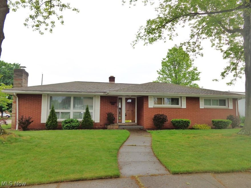 Attractive 4 Bedroom, 2.5 Bath Brick Ranch on Large Corner Lot, Double Carport and Detached Garage with 25x15 Patio, Open Concept Living Area with Fireplace and Comfortable Eat-In Kitchen, Finished Basement features recreation area, workshop/storage, bedroom and full bath, Very Well-Manicured Yard and Landscaping, All Around Easy Maintenance!