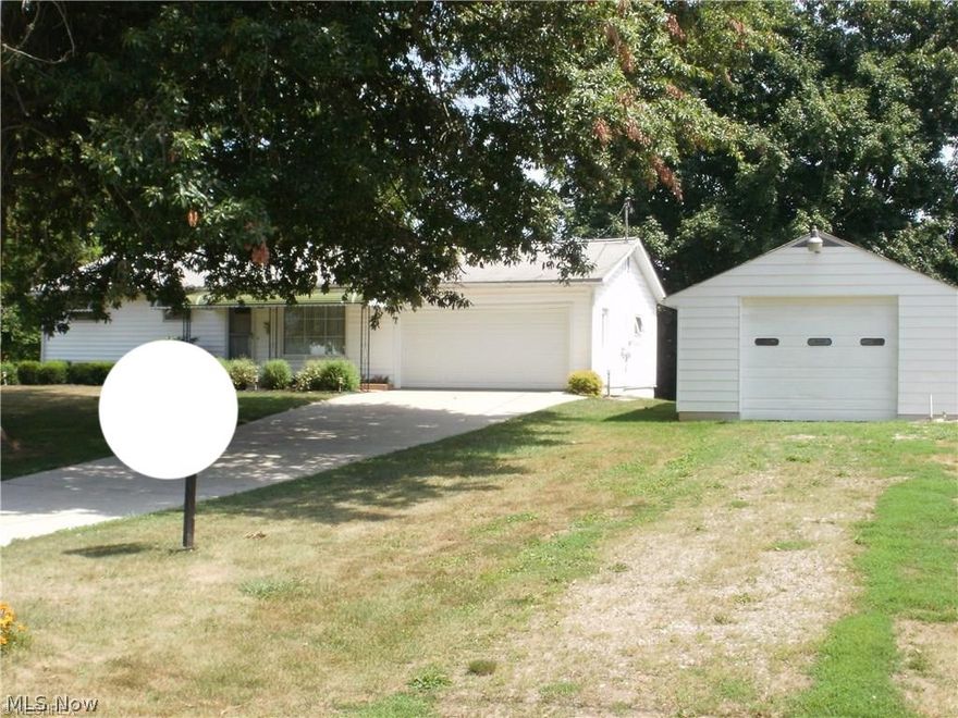 Riverfront property with 200 ft of frontage. Walkout finished basement to covered patio with hot tub.  Corian countertops in kitchen, deck off kitchen over overlooks the beautiful Muskingum River,  very nice heated shop with hoist, was a boat repair shop.