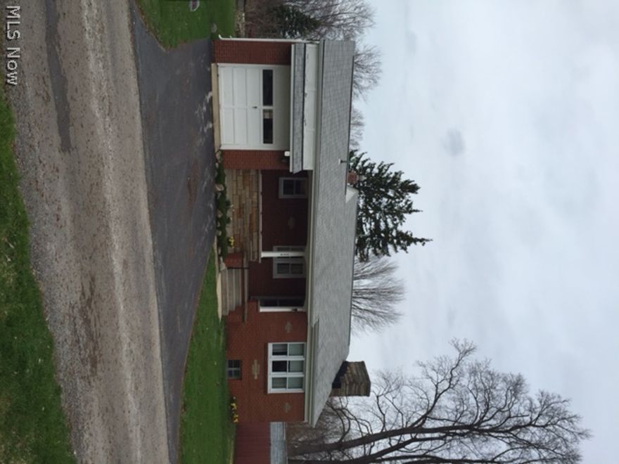 Brick ranch with spacious living room with fireplace and built ins. Dining area off the kitchen. Cozy lower lever rec room with new carpet in April 2015. Also, fireplace in rec room. Laundry area with washer and dryer. Private side entry to lower level rec room. 1 car garage. Newer windows, furnace and ac. Great yard with space for everyone!!!