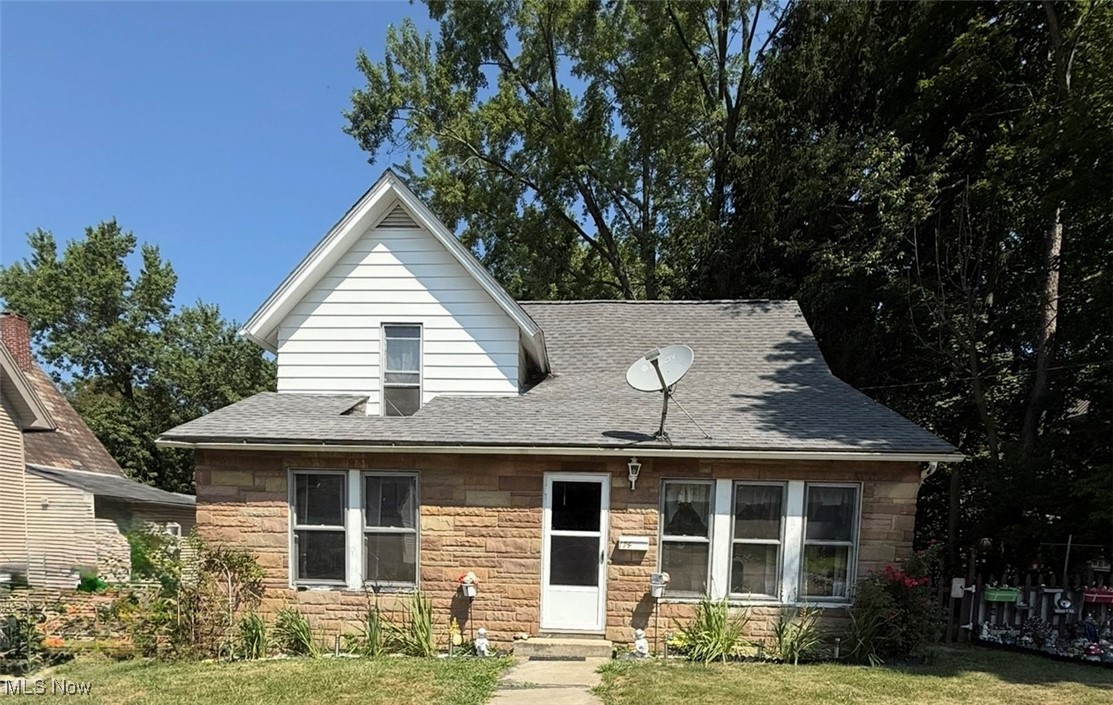 Charming 2 story aluminum sided home featuring 3 bedrooms and 2 full baths. Enclosed porch, living room, spacious dining room, kitchen, bedroom and full bath complete the first floor. Upstairs 2 bedrooms and full bath. Updates include first floor bath, flooring and paint throughout. Full unfinished basement. Detached 2.5 car garage. New roof approx. 5 yrs. Partially fenced back yard. Come take a look!