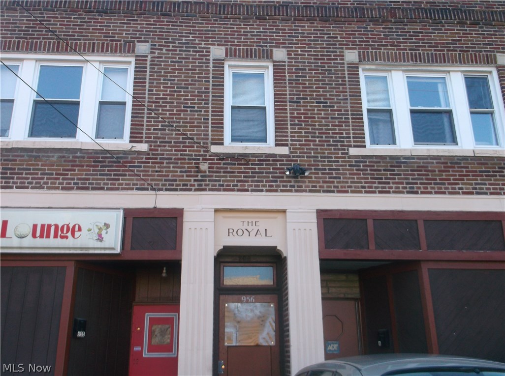 Total brick building. 2 one bedroom apartments - rents for $450 each plus utilities. Bar on first floor - liquor license included D2X D3 open till 1:00am. Most equipment stays. License is for bar, basement, and patio (fenced in). A/C-6 years old - bar only, 4 furnaces, 2 HWT, 4 gas meters, 4 electric meters, 1 water meter, roof 4 years