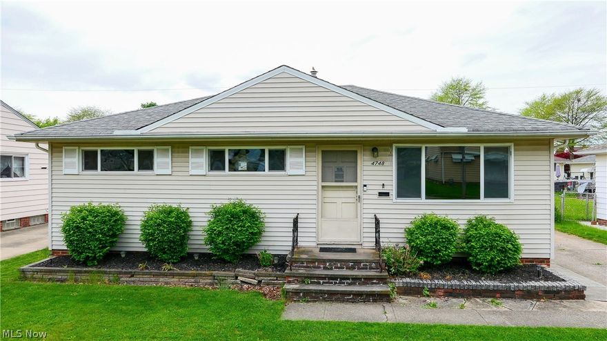 4748 Brookhigh Dr, Brooklyn Ohio 44144 is a wonderful home in an awesome neighborhood! This beautiful Ranch is single floor living at its best AND has a Lower Level finished Family Room, hobby area with great storage & Laundry area. The main ranch living has a galley kitchen with Granite Countertops, stainless steel deep kitchen sink, KraftMaid Cabinets with a great layout, stainless steel & black appliances! The Kitchen opens to an awesome eat-in area large enough for family dining with Sliding Glass door to the rear patio & back yard that is mostly fenced, is great for entertaining, grilling, fun & games or just relaxing. The Living Room is huge with hardwood flooring & leads to the front porch & 3 bedrooms with hardwood floors on the opposite end. The Main hall bathroom has been updated, includes a tub/shower combination with ceramic tile & nicely designed vanity with storage. Utilities average around $250 per month, high efficient gas furnace is easy on the budget, washer & dryer a