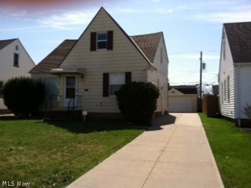 WOW Great home in Garfield Hts. 4 Bedrm, 2 full bath Cape Cod w/loads of rooms & updates. New driveway & garage, windows, furnace & air, plumbing & electric, waterproofing done on the backside of home, all done in '09.