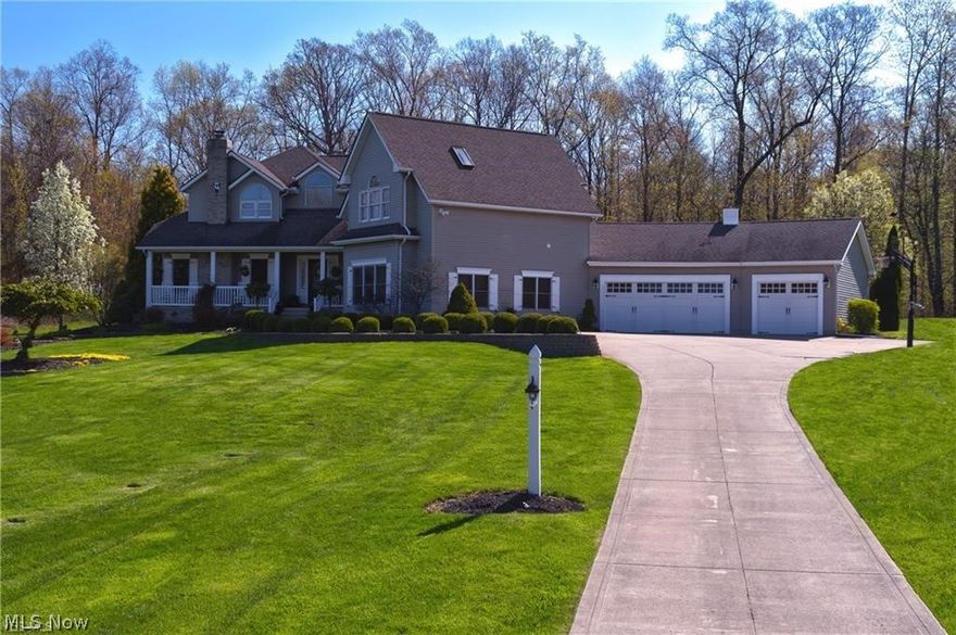 This breathtaking home sits on just over 2.5 acres in a park like setting. The peaceful Perry neighborhood will guide you to your new home that has "retreat" written all over it. The striking Brazilian wood floors welcome you in and compliment the granite counter tops and Pecan cabinetry. The gourmet chefs kitchen will have the most particular cook inspired. From the massive fridge, double ovens, 2 dishwashers, mini beverage fridge, there is nothing else you would need. The kitchen is open to the formal dining room that shares a double sided fireplace with the great room. There is a large office on the first floor with a wood burning fireplace that overlooks your yard making "working" a dream. You will have a hard time deciding which master bedroom you want to pick as there are 2 in this home! There is also a spacious third bedroom upstairs. You have 2 additional bedrooms in the lower level along with a work out room and expansive laundry room. Entertaining in this home will be a breez