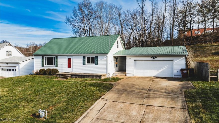MOTIVATED SELLER. SIX-bedroom home in Marietta, Ohio, presents a fantastic opportunity for a new owner. This home provides a thoughtful layout that includes spacious living areas, multiple bedrooms, and the potential for a second-floor master suite, the home offers ample flexibility for various needs. You will love the beautiful hardwood floors throughout and natural light bursting through the windows, along with unique features like a laundry chute and whole-house intercom! The finished basement has a kitchen, and its own private entry could serve as a separate apartment, providing excellent potential for bonus income. There is a large two-car garage with a built-in workshop and half bath.