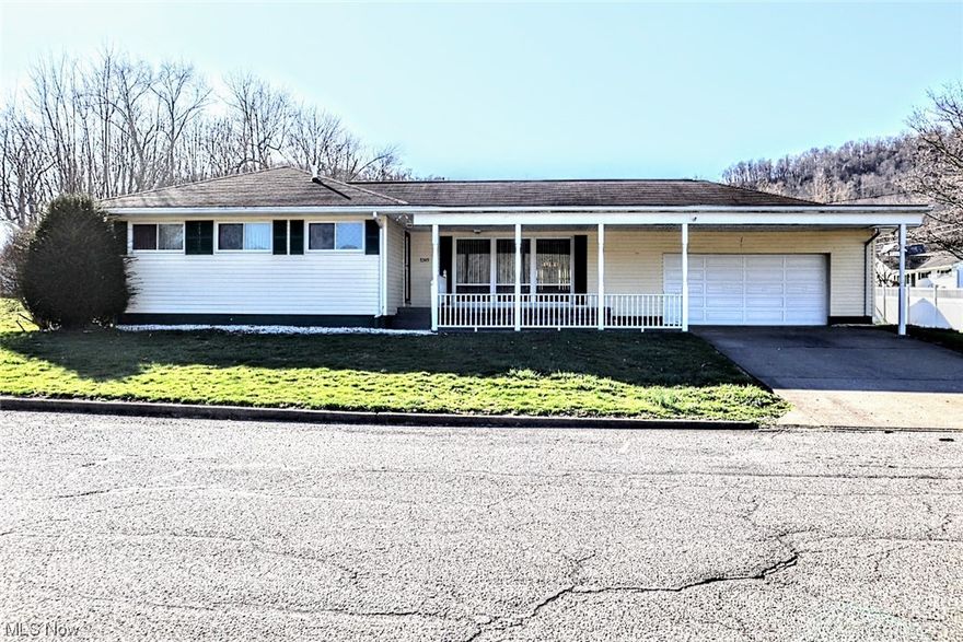 Back on the market through no fault of the home! Rare opportunity to live in Schupbach Addition!! This adorable ranch home is awaiting a new owner!  The charming abode boasts 3 bedrooms and 1.5 baths and can easily be converted to a full bathroom with the addition of a shower (plumbed and ready)!  Large living room bay windows and a covered front porch provide a spectacular view of the Ohio River.  A large finished basement is perfect for storage or could be easily finished for additional bedrooms, a recreation room, or a family room.  Additional features included basement access through the garage, a partially fenced-in yard, and outdoor storage shed.  Conveniently located near the River Elementary/High Schools, Hannibal pool, and New Martinsville bridge.  Call for your private showing!  This will not last long!