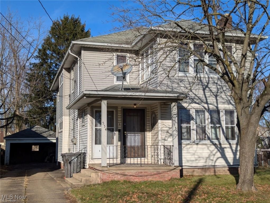 Looking to add an affordable property to your rental portfolio? This quality-built duplex is definitely worth a look. The attractive, vinyl sided exterior features a covered front porch with separate entrances to each unit. In the back is a large two car garage, a wooden deck for enjoying some outdoor relaxation, and another set of separate entrances. A shared basement is all set with washer and dryer hookups, a toilet and shower stall. The gas and electric are separately metered, and each unit is serviced by its own updated electrical panel, furnace and hot water tank. Near hundred-year-old structures are often lacking the historic details that once made them something to behold. Not this structure! There's nothing like the warmth and richness of unpainted, stained wood and this duplex features an abundance of it throughout. Most of the rooms feature hardwood flooring with oversized baseboards, solid wood doors and casing, crown molding, and built in shelving next to the fireplaces. The kitchens boast extra-tall cabinets, and the hallways have tall linen closets with shelving and drawers for plenty of storage. These are large units, each measuring just under 1,500 square feet. In each unit you will find a kitchen, a full bath, two large bedrooms, a breakfast nook, dining room, land a large living room with a sitting area. This duplex has had many recent renovations including the following: painted kitchen cabinets, plaster repairs and paint, vinyl plank flooring in kitchen and eat in area, some new vinyl replacement windows, showers added to tubs including tile shower surrounds and updated bathroom lighting and sanded hardwood floors that were stained and clear coated with polyurethane Two new tenants are paying $850/month along with gas and electric and locked into 1 year leases.