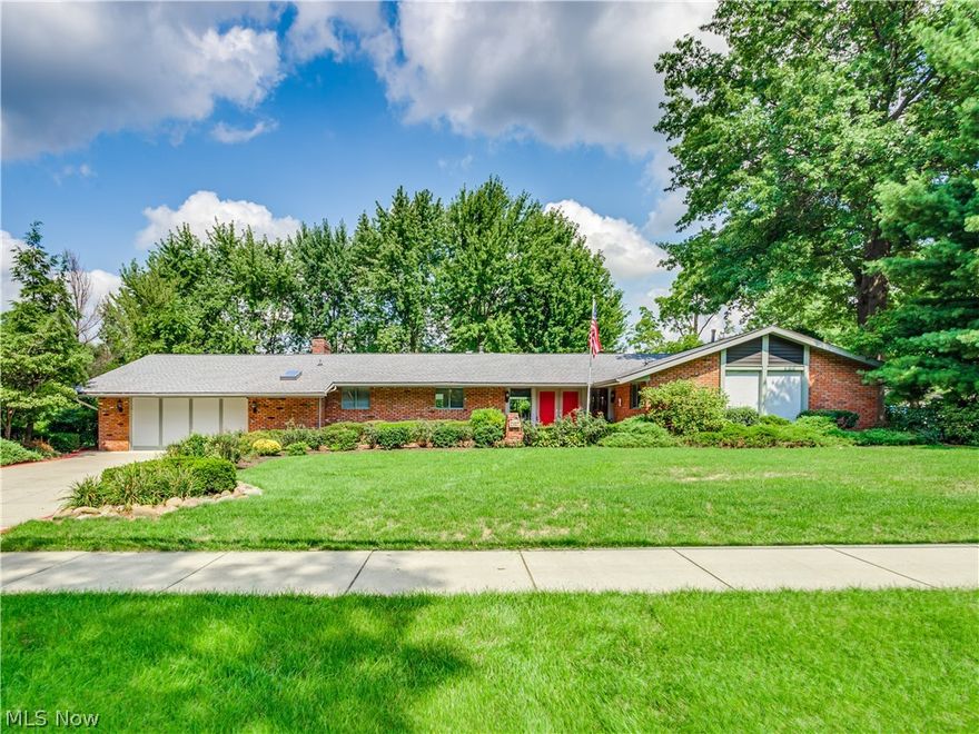 Unique Ranch in Stow. As you enter this 3 bedroom 2.5 bath home you will notice its distinctiveness. The owner of this home is the original owner and a builder.
There is a very open feeling from the living area and into the dining area as well as the kitchen. The family room is cozy and has a fireplace. The vocal point of the home is the very large garden room surrounded by windows. It has a fireplace and a bar. The sky is the limit on this particular space. The kitchen has been updated with granite counter tops and includes the appliances. The master bedroom has many built in drawers and storage. There is an extra room off of the master being used as an exercise room, it has a fireplace too.. There are sliders out to one of the two court yards. The laundry area is very conveniently located and the washer and dryer stays. The lot is spacious as well as private. There is an attached 3 car garage. Roof 2019, hot water tank 2020. Home warranty provided