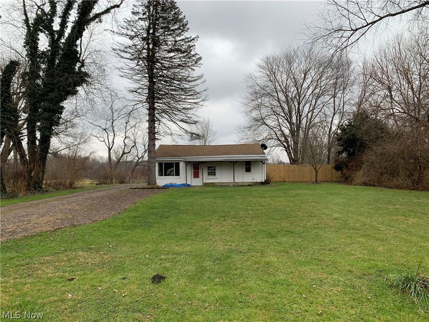 INVESTORS WANTED!  This property is a perfect investment to add to a portfolio!  County setting on the dead end street partially fenced in flat usable half acre.  Electric has been updated along with some windows.  Interior freshly painted.  Kitchen with fully furnished appliances.  Washer and Dryer also included