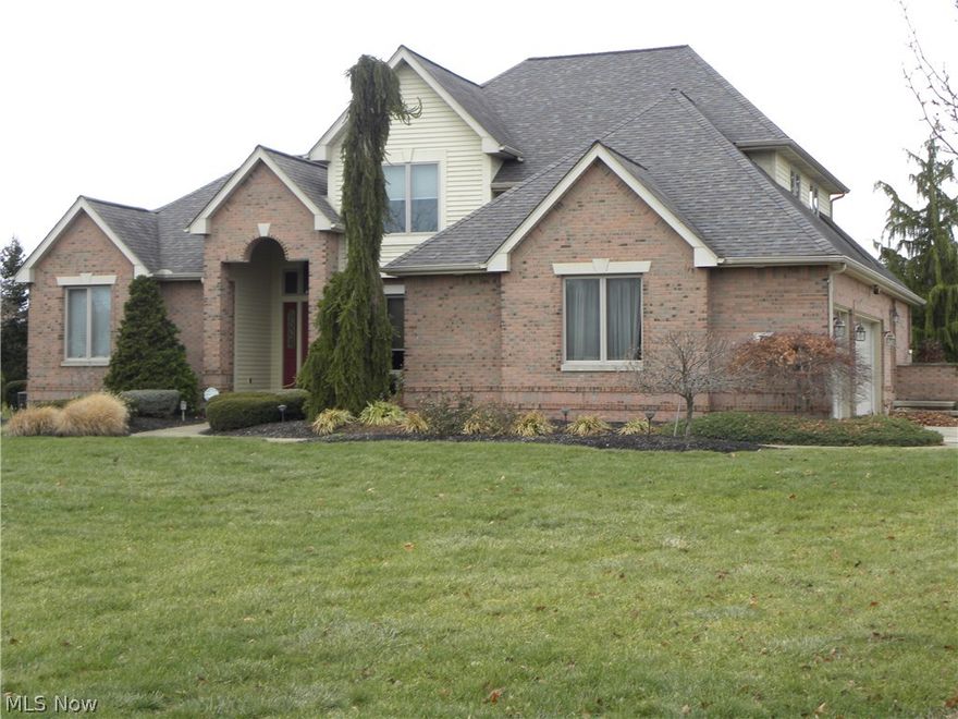 Immaculate, move-in ready, brick ranch-style living Master Bedroom, Master Bath, Walk-in closet & laundry on 1st floor, with guest/family bedrooms & bath upstairs, finished basement. Custom designed, one-owner, open floor plan, many updates, beautiful wood, tall ceilings, cathedral ceiling living room. Professional landscaping surrounds. Private back has deck facing sunsets above corn fields. Milan Schools. Pet-friendly neighborhood. Jacuzzi hot-tub negotiable.