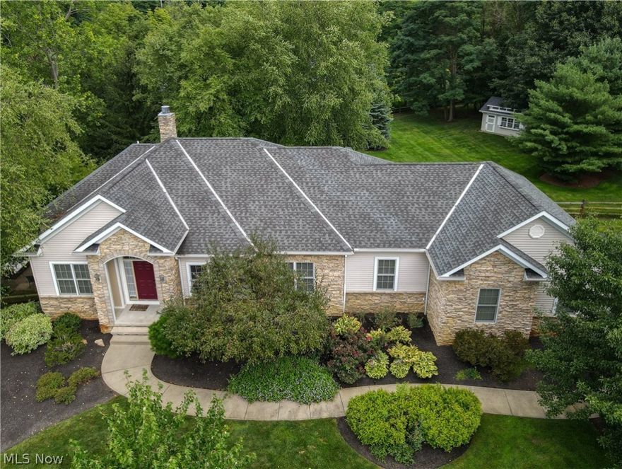 Are you looking for that rarely available 3500+ finished sqft ranch w/ walk-out basement, 3 car attached garage on over 2 private acres of professionally landscaped bliss? Welcome to this spectacular custom built ranch on a quiet cul-de-sac street in award winning Kenston school district! This right-sized ranch is even better in person from the soaring ceilings & stacked stone fireplace to the elegant open concept kitchen design with walls of windows, overlooking the entirely private and fenced in backyard, perfect for your 2 and 4 legged family members. Enjoy a huge deck for summer dining, or an adjoining patio space--lots of indoor and outdoor options! The large primary suite sits apart from the other bedrooms and has 2 walk-in closets, spacious bathroom with dual vanities, soaking tub and large tile shower. Two more bedrooms, a full bathroom, a powder room and a large laundry room share the other wing of the 1st floor. Downstairs a 4th bedroom (currently being used as a home gym) ha