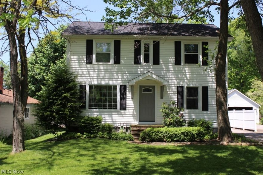 This move in ready home offers an open family room with beautiful hardwood floors, beamed ceiling and fireplace. There is a first floor bedroom, office and full bath. Upstairs there is another full bathroom, 2 bedrooms and 3 large walk-in closets. The patio leads into a fenced backyard perfect for privacy and pets. The home also offers a spacious 2 car detached garage. The current owners have done numerous upgrades including HVAC system, hot water tank, siding, roof and carpet just to name a few.  Come and see this Bainbridge home, walking distance from Chagrin Falls and the Chagrin Falls school district.