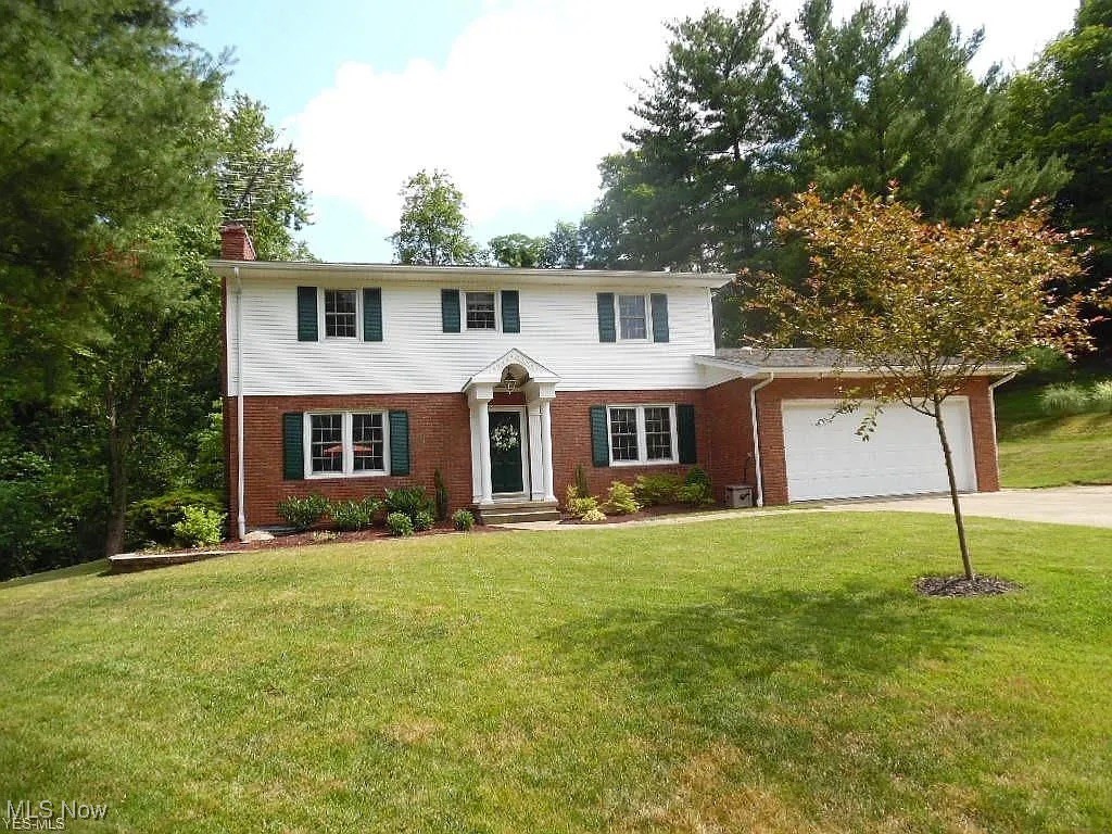 Situated on a quiet cul-de-sac in North Hills, Marietta. This classic 2 story home has had modern updates and restoration including the original oak flooring, newer kitchen and bathroom cabinetry, flooring, hard surface counter tops and electrical and plumbing fixtures. There are 2 cozy fireplaces to bring you warmth in the cold winter months ahead and a special heated and air conditioned 4-season room at the rear of the home for relaxing and viewing the abundant wildlife at the rear of the home.