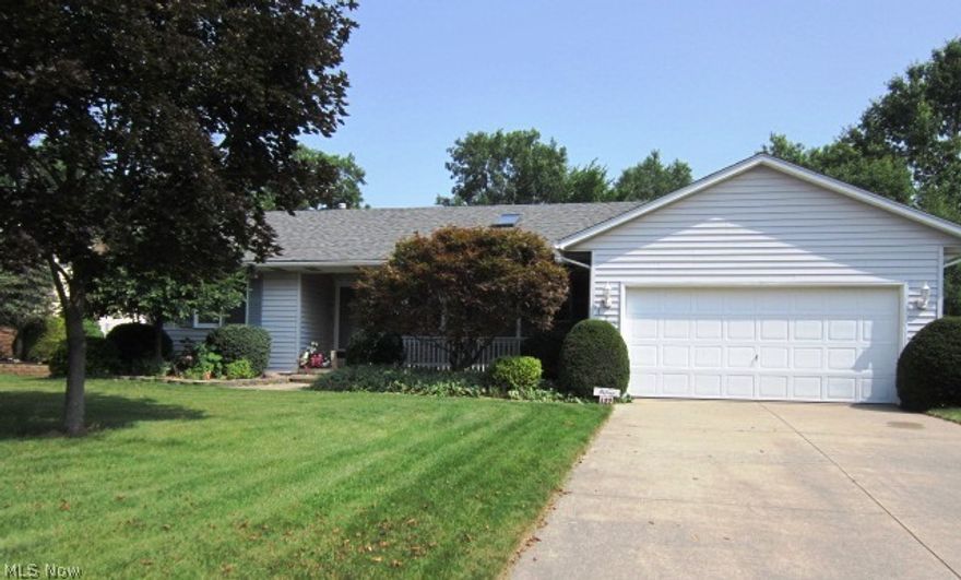 Your search for a well maintained Ranch, located in one of Wadsworth's quaint neighborhoods is over! This home features a desirably open & entertainment friendly floor plan. The  Great room features include cathedral ceilings, skylight, cozy wood burning fireplace and is large enough to accommodate a Formal Dining area, if needed.  A 3 season room and 20 X 16 deck are fully accessible from the Great room to enjoy the beautifully landscaped backyard. The fully applianced Eat-in Kitchen has ample cabinets and counter space, including a pantry and a media desk area. An Owners Suite has its own bath with dual sinks, 3 closets and is located on the opposite side of the center living area as are the 2 additional, nicely sized Bedrooms and Full bath. Garage is 20' X 20'. The full basement is plumbed for a Full bath ( commode already set in place ) and can easily be finished for added living space. Roof 2003. HWT 2013. Sump pump 2012. Call to see today!