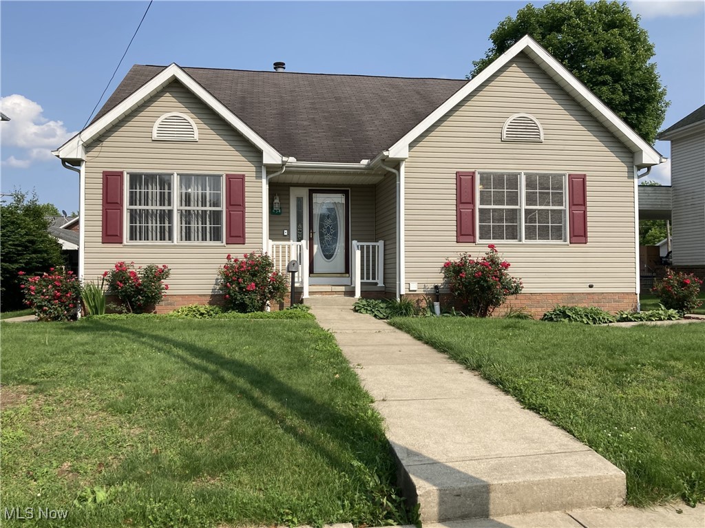 This well-maintained 2002-built ranch home with a finished basement sits in the heart of town on a quiet residential street. The property was designed for single floor living, with a nice open floor plan that flows from one room to the next and keeps everything close together yet spacious, including the two car attached garage. Coming in the front door brings you into the large main living area, featuring a gas log fireplace. To the left behind French doors is another nice room full of natural light currently used as an office but with a range of possibilities. Moving through the living room takes you into the dining area and around to back entry and the eat in kitchen. There are newer stainless-steel appliances (2023) and plenty of closets and pantry space as well. The large main bedroom with an en-suite bathroom and walk-in closet is located off of the living room as well. A hallway takes you to the convenient laundry room with storage and utility sink, another spacious bedroom, full bathroom, exterior side door, and the steps to the basement. Downstairs the basement has been finished but still allows room to make it your own. There are lots of storage rooms as well as another full bathroom and a room currently used as a bedroom, although the small window makes it non-conforming. The owners have taken great care in keeping this home maintained, clean, and updated. Newer luxury vinyl plank flooring, paint, and updated light fixtures have been installed throughout the house. This is a solid home ready for you to make it your own.