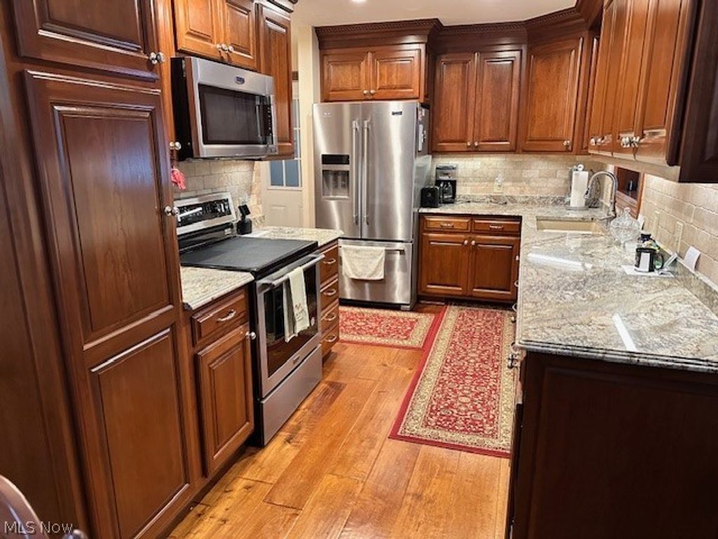 Photo of 8030 Leaver Avenue NW, Canal Fulton, OH 44614 (MLS # 5191916)