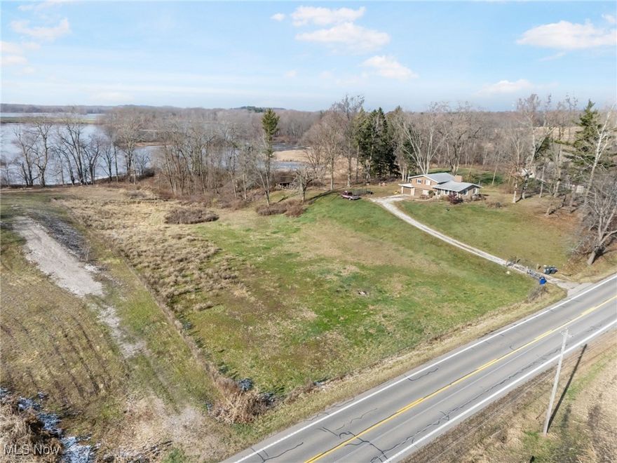 Beautiful building lot overlooking water. Totaling approximately 1.5 acres, this vacant land in rural Ohio offers incredible views. Overlooking Wingfoot Lake, you’ll find plenty of wildlife & peace within your surroundings. Five minute drive from the heart of Hartville. The best part is the location with this. Within 20 minutes of anything you might possibly need. Septic plans have been drawn up and soil samples have been completed. Contingent on parcel split being finalized with a surveyor and the county. In progress.