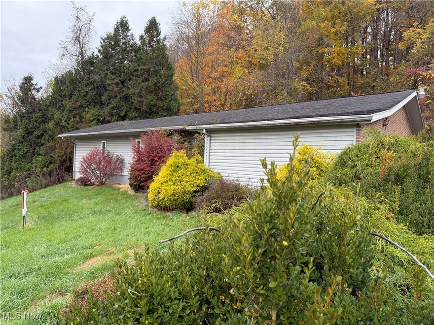 State Rt 800 just north of Barnesville village limits.  This site offers a one story building that includes 1928 square feet of open space.  There is a bathroom and a second space that was another bathroom turned into a laundry room.  There are not partitions.  This would well-used as a retail store, office space or large gatherings.  Concrete parking lot offering numerous spaces.  The building is elevated above the main road (State Rt 800 as you enter Barnesville from I-70), with excellent drive-by visibility.