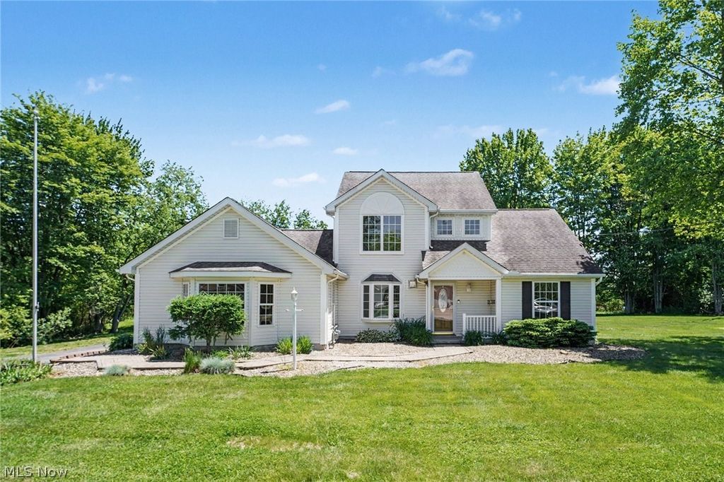 Photo of 62 Rockaway Drive, Roaming Shores, OH 44085 (MLS # 5214532)