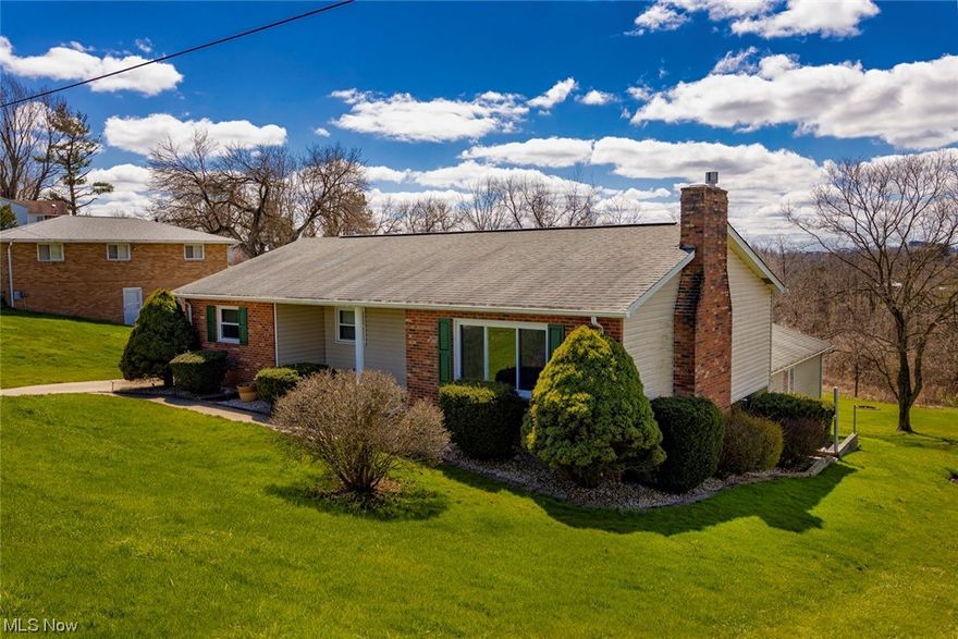 St. CLAIRSVILLE!!  WELCOME to 67718 Graham Road! This BEAUTIFUL Ranch Style home offering 3 bedrooms, 2 full and 1 half baths, and an attached 2 car garage sits in a much sought after neighborhood. Let's HIT THE HIGHLIGHTS... GORGEOUS OAK eat in kitchen with an eat at island,  open concept floor plan including kitchen, dining room and living room (w/an all brick fireplace!) The lower level features another all brick fireplace in the rec room PLUS a half bath.  There is a relaxing front covered porch, large concrete drive, rear patio, above ground pool (surrounded by trex decking/railing) and a CARPETED BREEZEWAY to the full walk out basement.  SO MUCH TO OFFER!! CALL TODAY!!