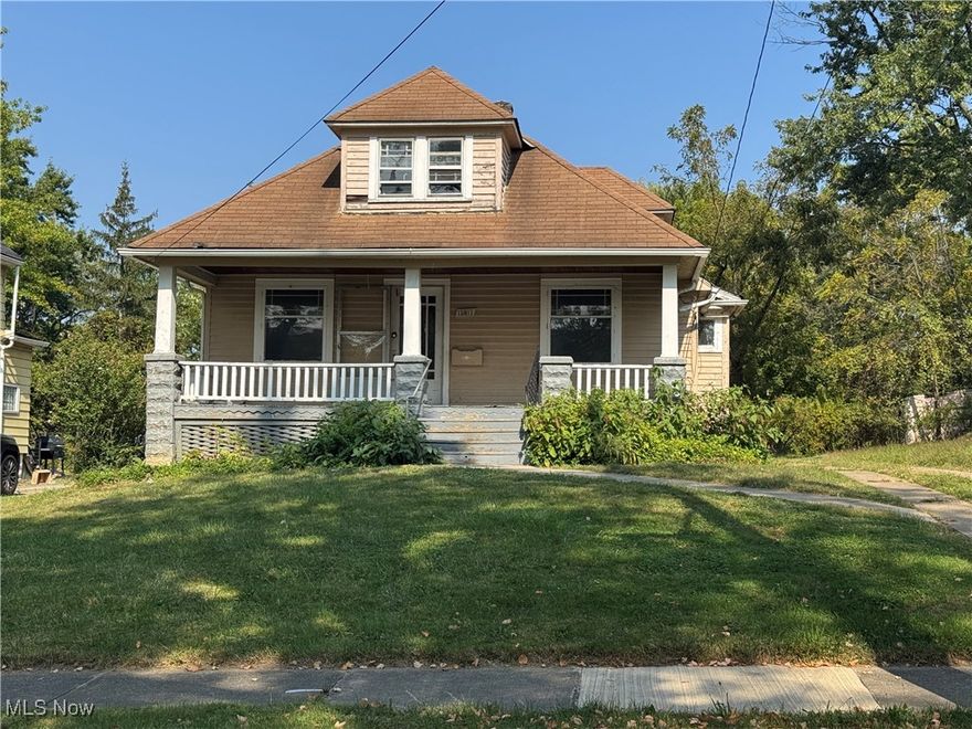 Charming 3 Bedroom, one bath Bungalow with fourth bedroom expansion Potential. 
Featuring two spacious bedrooms and a full bath on the main level, this home also boasts a bright kitchen, a formal dining room with beautiful leaded glass cabinets, and a warm living room highlighted by a gorgeous brick decorative fireplace and hardwood floors throughout. Relax on the full front porch or enjoy the oversized, partially finished attic, perfect for partitioning into two additional bedrooms to suit your needs. The property includes a full unfinished basement offering plenty of storage or future living space, an updated breaker box for peace of mind, a two-car garage, and a large backyard, ideal for entertaining or gardening. Discover a fantastic opportunity with this inviting bungalow, ideally located near the highway and shopping for ultimate convenience. With value-add potential to flip and a great investment to grow your portfolio or create your dream home.