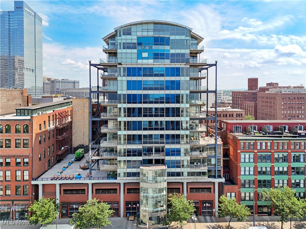 Located within a walkable, friendly neighborhood, making everyday life convenient with easy access to culture and activities. Welcome to The Pinnacle, a luxurious residential tower nestled in the vibrant heart of the Warehouse District in Downtown Cleveland. Experience concierge-style living with personalized services and amenities. This spacious residence offers over 2,000 square feet of elegant interior space, complete with two dedicated parking spaces. Enjoy breathtaking, unobstructed views of Cleveland's downtown skyline and Lake Erie through your expansive windows and private balcony. The open-concept floor plan is perfect for entertaining guests and relaxing in style, highlighting modern design and high-end finishes. Just steps from your door, discover world-class dining options, trendy cafes, boutique shops, and entertainment venues within a walkable, friendly neighborhood, providing everyday access to culture and activity.