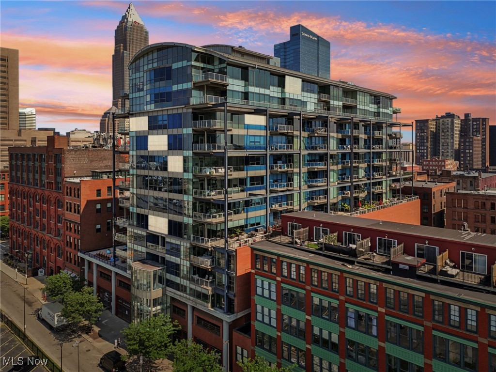 Located within a walkable, friendly neighborhood, making everyday life convenient with easy access to culture and activities. Welcome to The Pinnacle, a luxurious residential tower nestled in the vibrant heart of the Warehouse District in Downtown Cleveland. Experience concierge-style living with personalized services and amenities. This spacious residence offers over 2,000 square feet of elegant interior space, complete with two dedicated parking spaces. Enjoy breathtaking, unobstructed views of Cleveland's downtown skyline and Lake Erie through your expansive windows and private balcony. The open-concept floor plan is perfect for entertaining guests and relaxing in style, highlighting modern design and high-end finishes. Just steps from your door, discover world-class dining options, trendy cafes, boutique shops, and entertainment venues within a walkable, friendly neighborhood, providing everyday access to culture and activity.