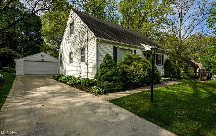 Do not let modest exterior fool you, this home is beyond incredible!  Fully furnished 3 bedroom, 3 full bath, with a studio apartment!  A charming Cape Cod on the lovely dead end Berkeley St in Kent.  Walking distance to the Kent State campus and to all the Water St pubs, dining and shopping!  Handsome original hardwood floors welcome you into the comfy living room and run through the main level.  A formal dining opens to the petite but efficient kitchen, which has had a cabinet refresh, newer vinyl flooring and a full set of updated stainless appliances!  Around the corner are 2 lovely bedrooms and a stunning full bath!  Upstairs you will find a large retro bedroom and an oversized full bathroom.  Originally a bedroom, this recently added bathroom is beyond!  Tile floor, quartz top vanity, amazing custom tiled surround and 2 huge closets!  Prepare your mind to be blown, before you head to the lower level.  This an entire apartment!!!  A fantastic bedroom area with LVP flooring that carries you into the jaw dropping kitchen.  Classic subway tile wall, expansive quartz countertops, crisp white cabinetry, floating shelves and stainless appliances!  There's and adorable dining spot, a pantry/coat closet and private walk-out!  This side is finished off by yet another extraordinary full bathroom!  We still have a luxurious laundry room doubling as an office!  Let's not forget the awesome covered back patio, great back yard, 2 car garage and recent concrete driveway too!  All updates completed in the last 9 years, including panel box, A/C and tankless water heater!  Do not risk missing out on this one, CALL TODAY!