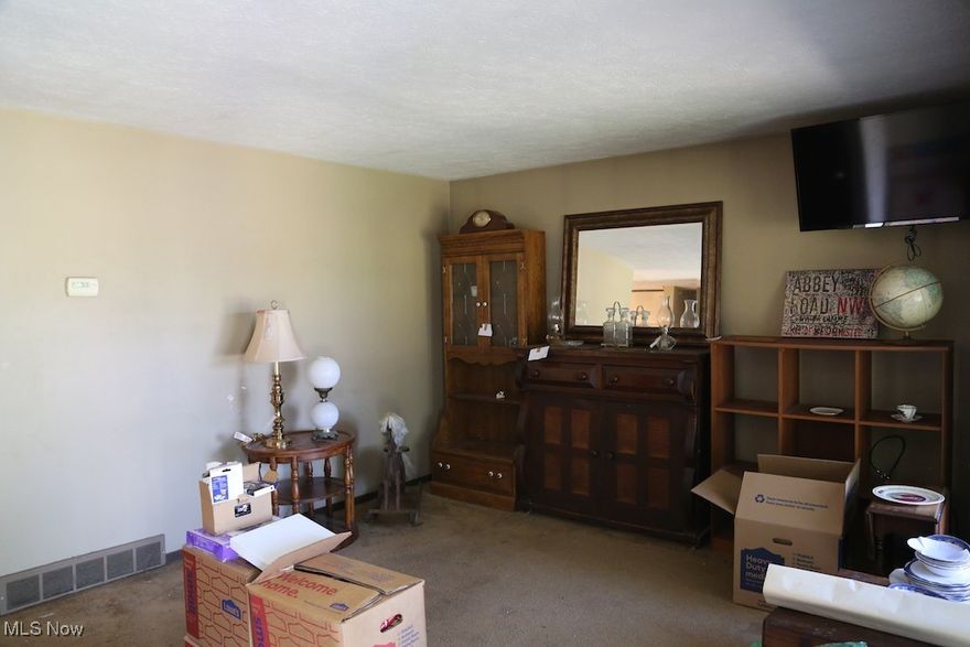 This is an estate. Needs spruced up and will be lovely when this is completed. 3+ acres and 3 out buildings and a hot tub indicate a peaceful area to live.