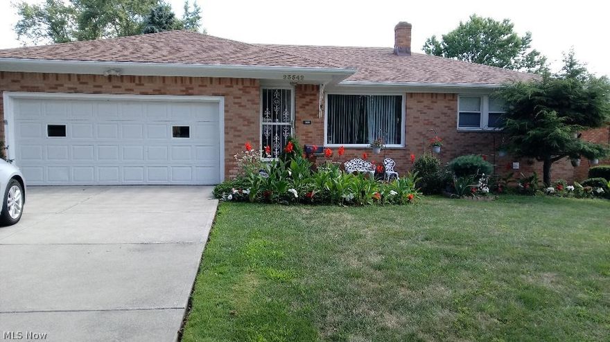 Lovely 3 bedroom brick ranch located on a private and quiet cul-de-sac street.  This home has great curb appeal with a beautiful landscaped large yard.  The outside features newer roof, concrete drive, newer windows throughout, 2 car attached garage garage, and security doors.  Enjoy the option of first floor living featuring gleaming hardwood floor throughout, large open country kitchen with walk-in pantry, 1.5 bath on first level.  The sellers are offering a home warranty as well as many appliances will stay with home.  (stove, refrigerator, dryer, dishwasher, microwave)  The lower level features a large basement with a shower stall located near laundry room, updated electrical and lots of storage.  Home will be violation free.  This home is tastefully decorated