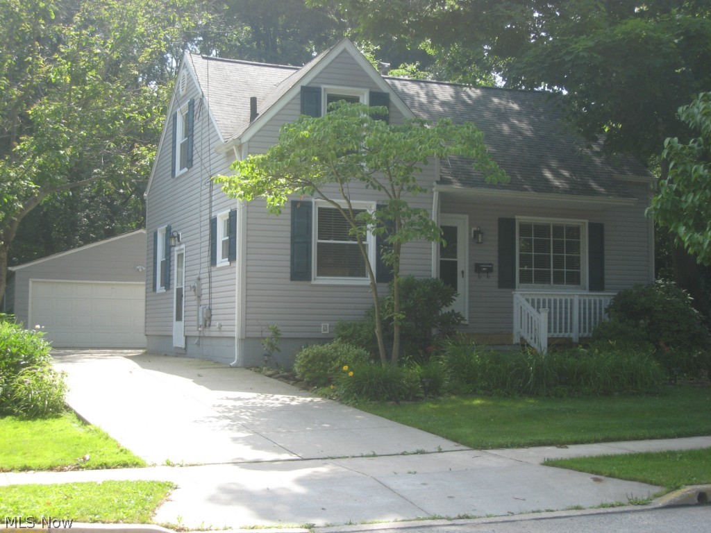 Move in ready and fast possession! Nestled in the trees this updated cape is minutes from the Kent State University campus. Walk in and place your furniture and you are done! Ample living room welcomes you as you walk on into the newer kitchen with granite counter tops and ceramic backsplash! Nice sized rooms and great storage. The master suite is suitable for a king size bed and has a walk in closet. There is a smaller room this level that could be used as an office/bedroom. The finished lower level adds and additional 373 sq. ft. of living area. Finished laundry room with closet. Updates include furnace, central air, kitchen, bath, roof, vinyl windows,and vinyl siding. It is a beauty! Private yard with lush landscape, deck and patio area. Over sized 2 car garage provides additional storage.