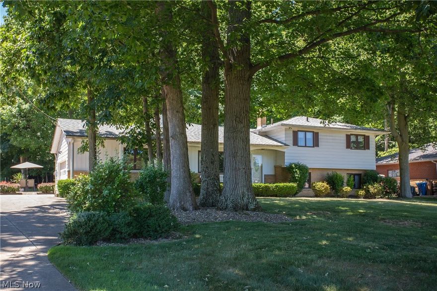 Welcome home to 2580 Royalwood Rd in Copley Township! This split level home is nestled into a wooded 1.1 acre lot within the Brenner Estates community. The original owner has taken great care of this home and has added onto the property throughout the 58 years of living here. First, imagine the possibilities of entertaining family and guests within the main living level featuring the family room, dining room, eat-in kitchen, full bathroom, and laundry room. Look out through the sliding glass doors of both the dining room and kitchen into the enclosed heated pool area and dream about the memories that will be made within the expansive space. Move the entertainment down to the walkout lower level which contains the living room/den, 4th bedroom, and another full bathroom. Continue to move down into the basement which could allow for even more space to relax and contains hookups to an additional laundry room! Ready for bed? You can find 3 bedrooms and 1 full bath on the upper level off the family room. Additional features include original hardwood floors under the carpet on main and upper level, an attached 2 car garage, 4 car detached garage with extra storage space, patio off of the pool building, 2019 roof, partially waterproofed with transferrable warranty, and the well/septic has cleared POS inspection. Come see for yourself the endless possibilities your future holds when you make 2580 Royalwood Rd. your home today! Contact the agent for questions or details.