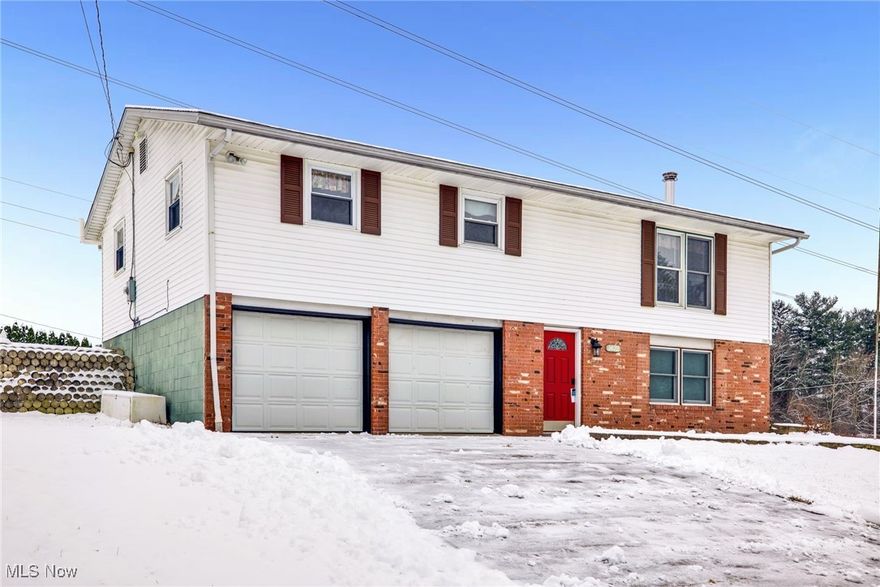 Nicely updated 3 bedrooms, 1.5 bath ranch home with approx. 1,444 sq. ft. of living space which includes a cozy finished family room with wood burning stove, built in desk nook, and a half bath in walk out basement. Brand new carpeting and paint throughout the home, along with new flooring in kitchen and both baths.  Very large living room and large eat-in-kitchen with updated appliances with French doors leading to a nice 18x12 covered screened porch which could easily be used during 3-seasons.  2-car attached heated garage with tons of cabinets for storage. Large corner lot with 12x10 storage shed. Located in Lake Township within the North Canton City School District.  Perfect starter or downsizing home.