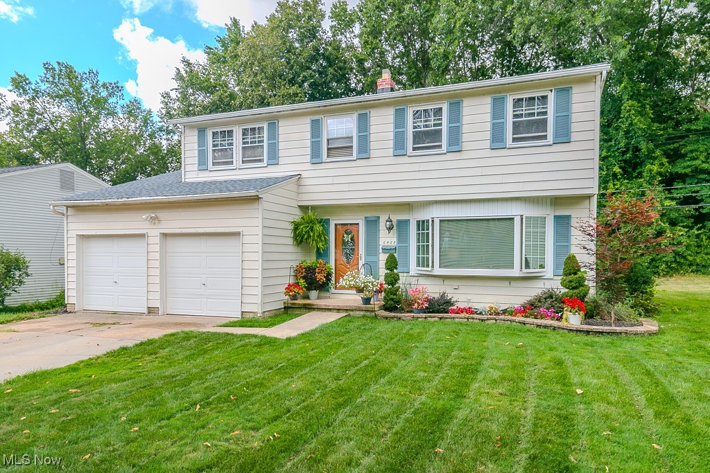 Great curb appeal and manicured landscaping set the tone for this inviting 4 bedroom, 1.5 bath colonial in Saybrook Hills! Step inside to a bright living room with a large picture window and a desirable open concept that connects to the formal dining room. The stunning kitchen features granite countertops, a mosaic tile backsplash, under mount sink, stainless steel appliances, and breakfast bar seating at the island, all with an unobstructed view into the spacious family room. Here, a full brick wall fireplace creates a cozy centerpiece, while French doors open to a lovely three season sunroom overlooking the fully fenced backyard. A stamped concrete patio extends the space for outdoor entertaining, with a convenient half bath on the main level for guests.
Upstairs, you’ll find four nice sized bedrooms along with a full bath featuring a tub/shower combo and tiled wall surround. The lower level is ready for your finishing touches, offering potential for a rec room perfect for movies and games. A two car attached garage, private yard, and location close to schools, shopping, and local amenities make this home an outstanding find. Call today to schedule your showing!