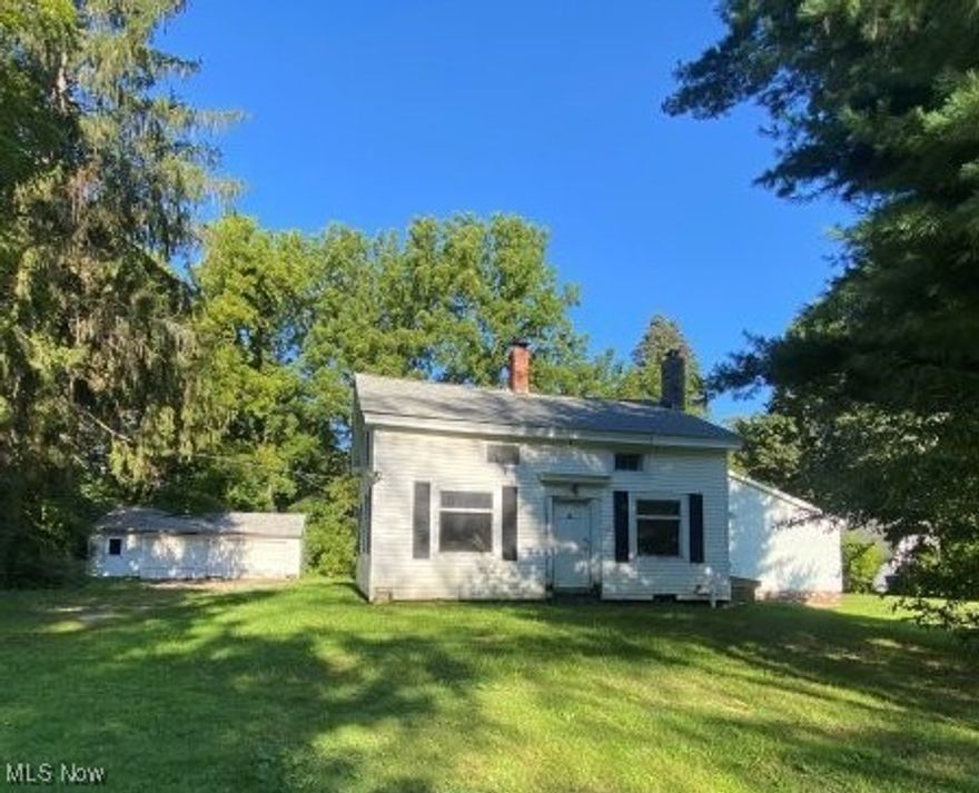 Versatile Living Space with dual spaces & design potential! Discover this unique 4-bedroom, 2-bath home offering flexible living arrangements and endless possibilities. One side of the residence features its own private entrance, full kitchen, generous living area, spacious bedroom, full bath, and convenient first-floor laundry. A secondary entry connects this space to the main home, which welcomes you with a blank-slate kitchen, ready for your custom design. The kitchen flows into a front room with a fireplace and a large living area. The first floor also includes a full bath and bedroom, while the upstairs boasts two tandem bedrooms offering flexibility. Home is situated on a large lot. This is a Fannie Mae HomePath Property.