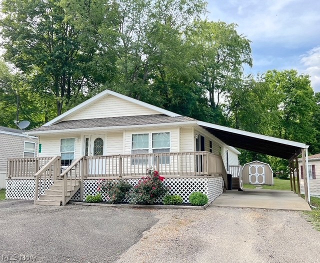Beautifully maintained home in a country-like location right on the edge of town! This 2004 Commodore manufactured home is in move in condition. There are 3 bedrooms and 2 full baths. It is located on a rented lot in Creekside Crossing with lot rent of 379.00 which includes lawncare and trash removal. There is a great open concept floor plan with cathedral ceilings. The large eat-in kitchen has a center island and includes the appliances. The master suite has a large walk-in closet and a private bath with a double shower and corner soaking tub. There is an attached carport, a wraparound deck and a large storage shed that will stay. This is perfect 1 floor living with little to no maintenance. Buyers must submit an application for approval by the park prior to closing. This property is located on Bluegill Lane. The sign is in the window.