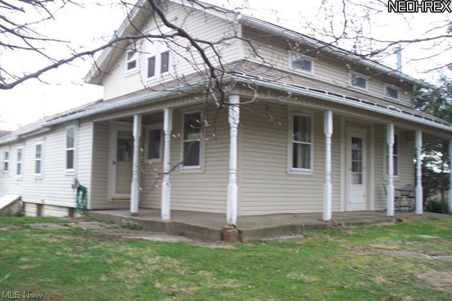 Five acres goes with this 1 1/2 Story home. First floor laundry, large living & family room, 2 baths, detached 2-car garage with workshop. Updated furnace & hot water tank, some replacement windows.