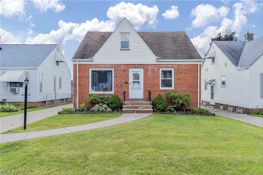 Move Right In! Beautiful Bungalow with 3 Bedrooms and 1.5 Baths. Freshly Painted, New Carpeting & Many Updates Throughout. Nice Living Room and Large Kitchen with Oak Cabinets, Ceramic Tile Flooring and Door to Outside Deck. Two Main Floor Bedrooms with New Carpeting and Ceiling Fans. Spacious Upstairs Master Bedroom is Fully Insulated, New Carpet, Ceiling Fan, 2 Large Closets which includes a Walk in Closet and 2 Big Storage Spaces. Nice Updated Main Floor Bathroom with Slate Tile & Refinished Tub. Nice Basement with Full Finished Rec Room, Nice Wood Paneling, Ceramic Tile, New Carpeting, Glass Block Windows, Custom Built Bar, Decorative Fireplace, Half Bath, Newer Hot Water Tank & Updated Electric Box. Great Fenced in Yard Beautifully Landscaped, 1.5 Car Garage & Deck. Great Location, Easy Access to Highways, Shopping, Schools, and Minutes From Downtown. City Violation Free, Must See!!