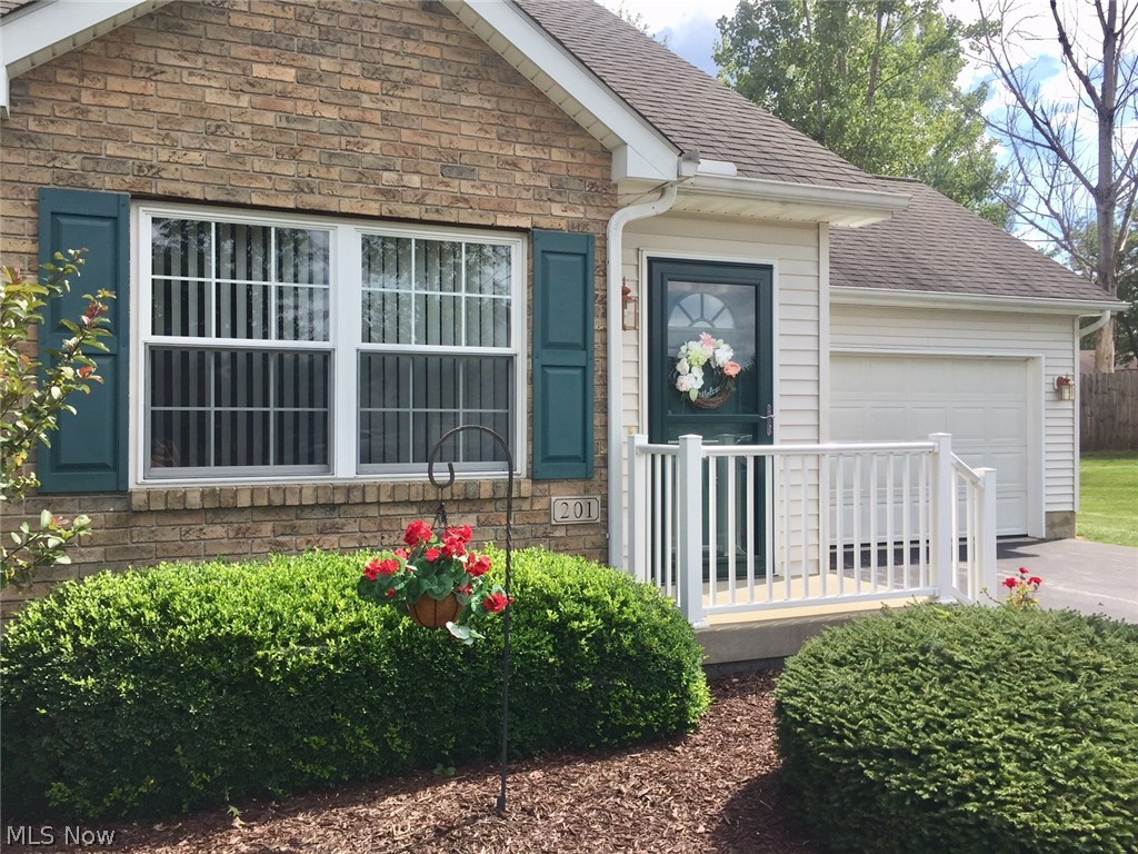 Beautiful 2 Bedroom 2 Bath Condo that is ABSOLUTELY Move In Ready offering Easy Living! End Unit. Immediate possession! Open kitchen with all appliances. Great room has vaulted ceilings and gas fireplace. Nice size 1st Floor Master bedroom with new sliding doors to delightful back patio for relaxation. 1st floor laundry and washer and dryer stay. 2nd bedroom is on 2nd floor offering extra storage and full bath. Updates include New front door, railing, laminate flooring in kitchen and laundry room, carpet in great room, dining area and hallway. Super clean 2 car attached garage that has been used for living space. Newer built in closets offer much more storage space in garage. Comes with a 1 Year Home Warranty to give you peace of mind. Don't wait on this one. Call Today for Your Personal showing!