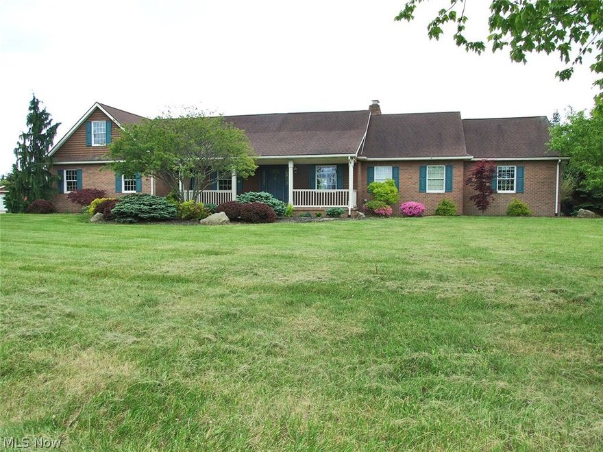 Quality Mini Farm.  Beautiful brick home with in ground pool, 3.5 car garage and hobby shop with barn on 6.65 acres.  Home features kitchen with oak cabinets, all appliances, Granite counter top, tiled floor and breakfast bar - dining room - great room with brick fireplace, vaulted ceiling, and walkout to large patio deck overlooking in ground pool, pool house, beautiful landscaped fenced backyard and gazebo.  Large bedroom with full bath and shower, walk in closet and Granite counter top - 2nd bedroom with double closet - full bath - first floor laundry room and half bath.  Upstairs having game room loft, bedroom with double closet and office/study.  Large full basement with storage shelves and exercise area.  200 amp electric, Vacuflo, security system.  Finished 3.5 car garage with openers and work area.  Concrete drive.  40x80 shop building with two 12x18 overhead doors, concrete floors with electric, attached barn with 4 stalls, overhead storage, tack room and 30x36 storage room.