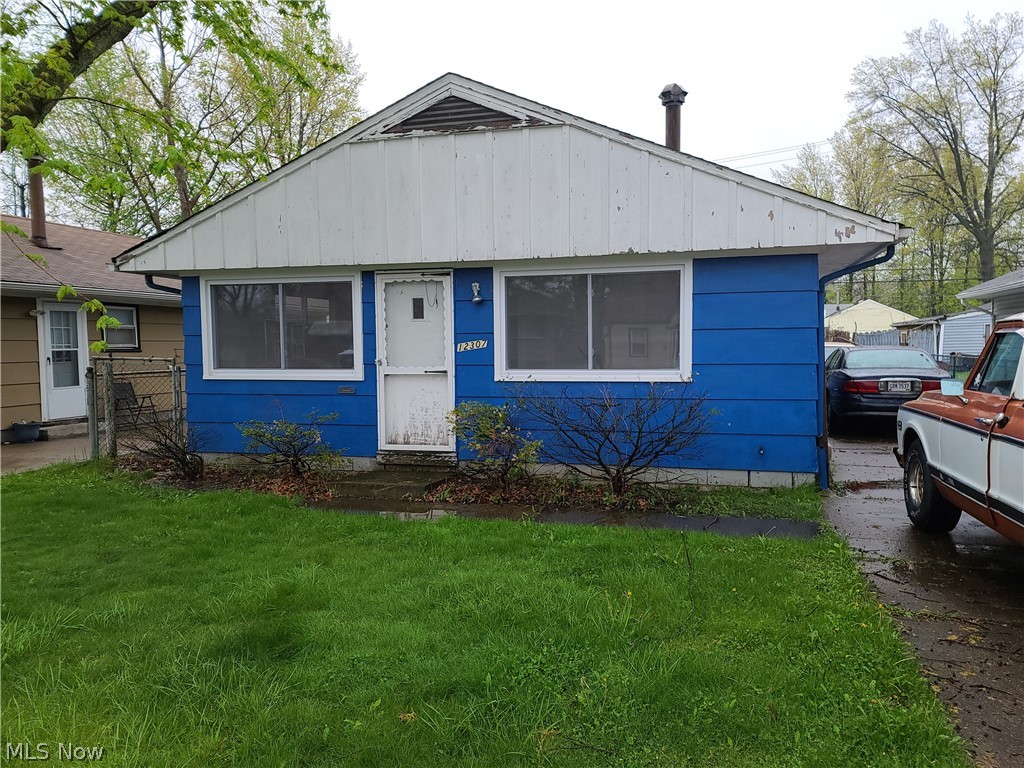 Attention Investors and Landlords: This home is ready to be updated! The house has been vacant for several years and the owner began renovating by removing the kitchen, installing new windows, and priming the interior walls. Seller to make no repairs.