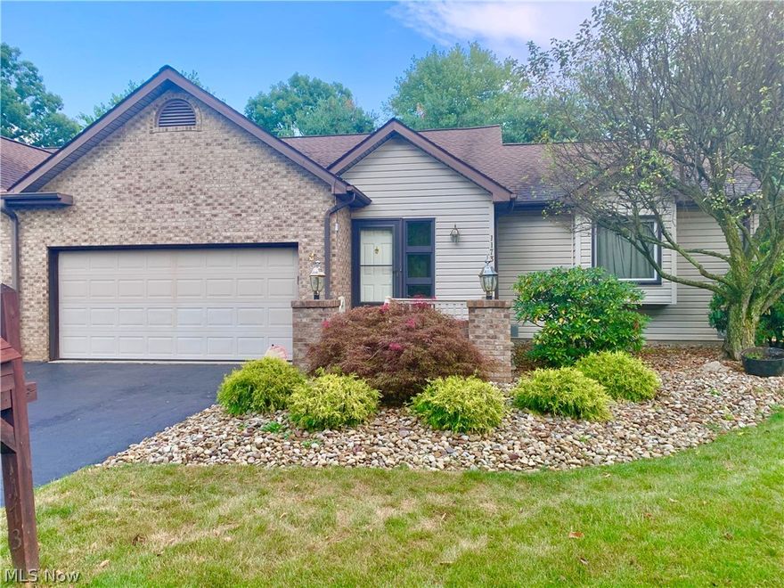 Move in ready Condo.  2 bedrooms, 2.5 bath and 2 car attached garage.  Open and airy great room with breakfast bar in kitchen.  Master suite with tons of closets, master bath with walk-in shower.  Partial finish basement with bar.  Large deck with automatic awing. Nature stone entry.