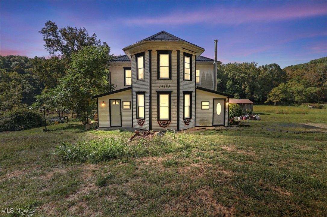 Looking for charm and character? Don't miss this beautiful 1889 Farmhouse situated on 2.19 acres in Tri-Valley Schools! Step inside to a welcoming entry with a wood-burning stove that flows into the spacious dining room—perfect for large family gatherings. The dining room connects to a generous kitchen with plenty of space for everyday meals. Just off the kitchen, you'll find a side porch currently used for pantry/storage—a great opportunity to convert into a 3 or 4 season room. The first floor also features a comfortable living room for relaxing plus a full bath with first-floor laundry. Upstairs, you'll discover 3 nice sized bedrooms with ample closet space (rare for a home of this era!). Enjoy outdoor living on the deck great for entertaining, with a large yard that includes a chicken coop, dog run, and open-stall barn. At the back of the property, a peaceful stream completes the setting. Additional highlights include a full basement with plenty of extra storage, a wood-burning furnace, and even a sunken tub. Throughout the home, you'll find 3 decorative fireplaces located in the dining room, living room, and primary bedroom—adding warmth and charm to each space. Filled with original charm—wood doors, trim, and floors throughout—this home also offers modern updates including a metal roof and new well pump (2021). With plenty of parking and privacy, this property combines history, character, and functionality. Dishwasher has not been hooked up. Seller needs to find suitable housing.